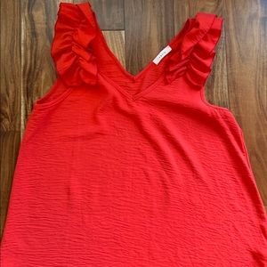 Red ruffle tank